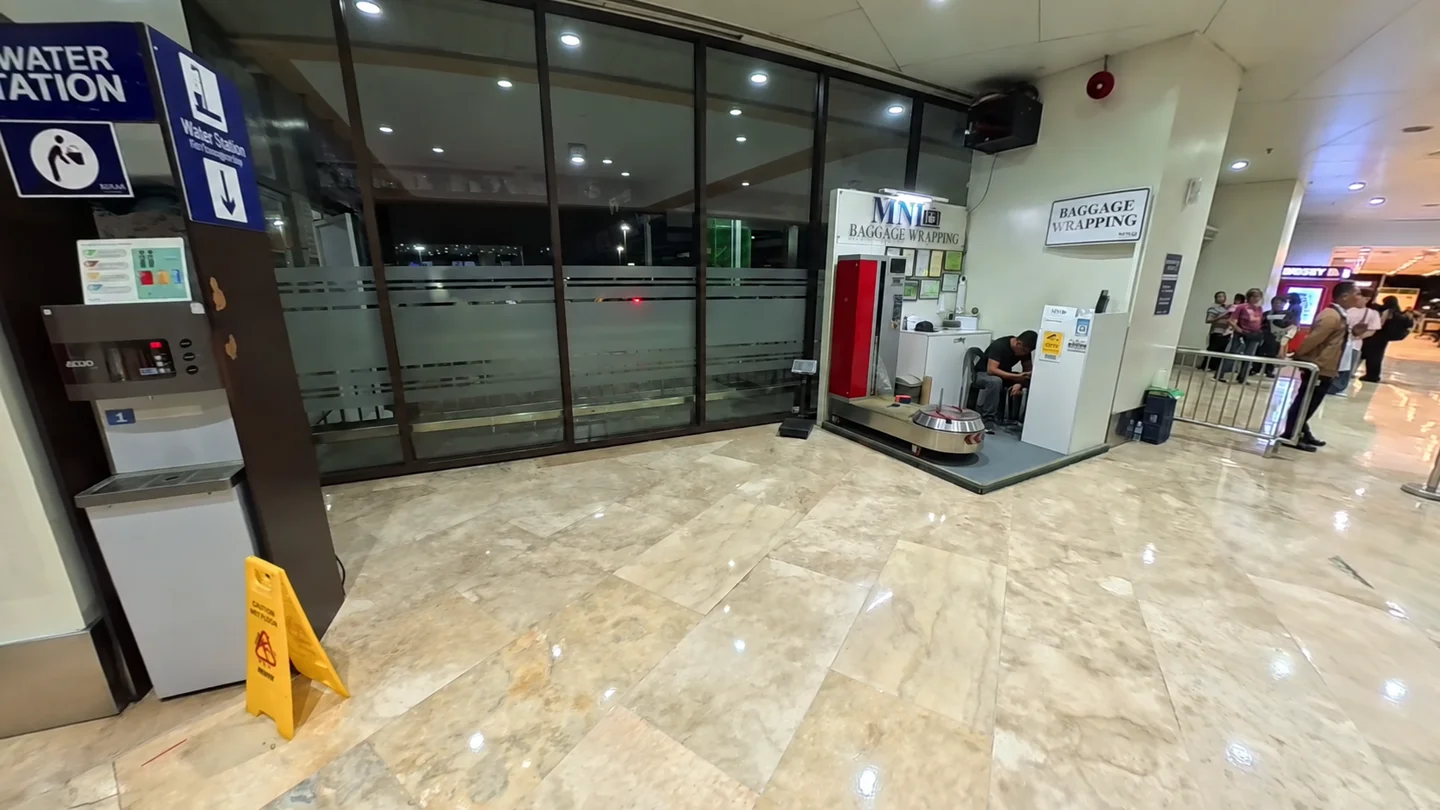 ニノイアキノ空港内の荷物ラッピングサービスの場所